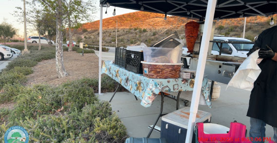 Example of an improper mobile food set up includes incorrect food storage and no hand-washing sink.