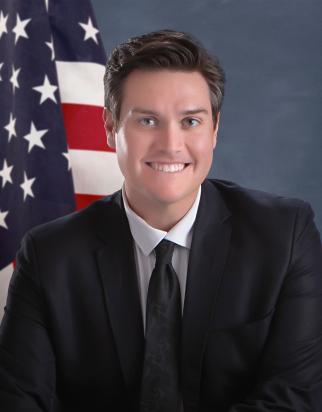 Portrait of District 1 Commissioner Miles Lucero