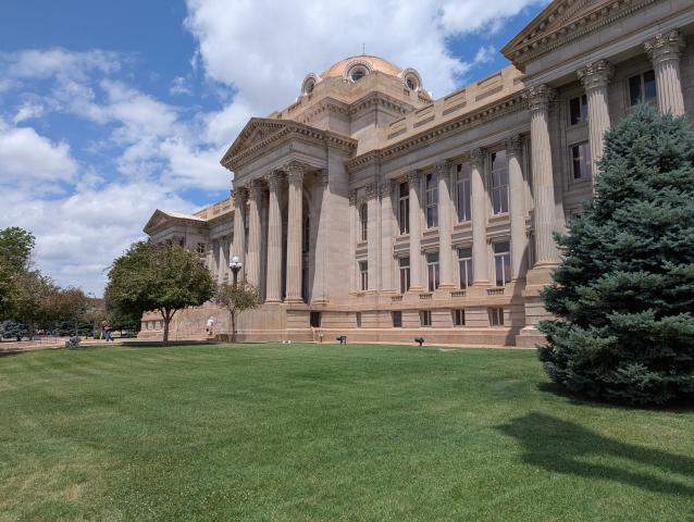 A photo of the courthouse and the grounds in front of it
